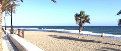 On the beach, beach towels