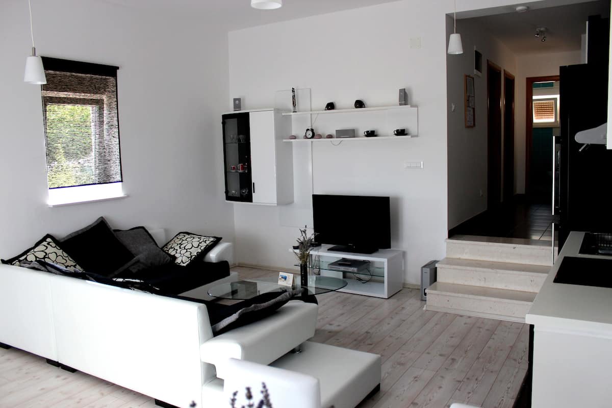 Exclusive Apartment, 2 Bedrooms, Terrace, Sea View | Living area | Flat-screen TV