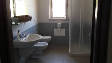 Quadruple Room, Balcony | Bathroom | Shower, free toiletries, hair dryer, bidet