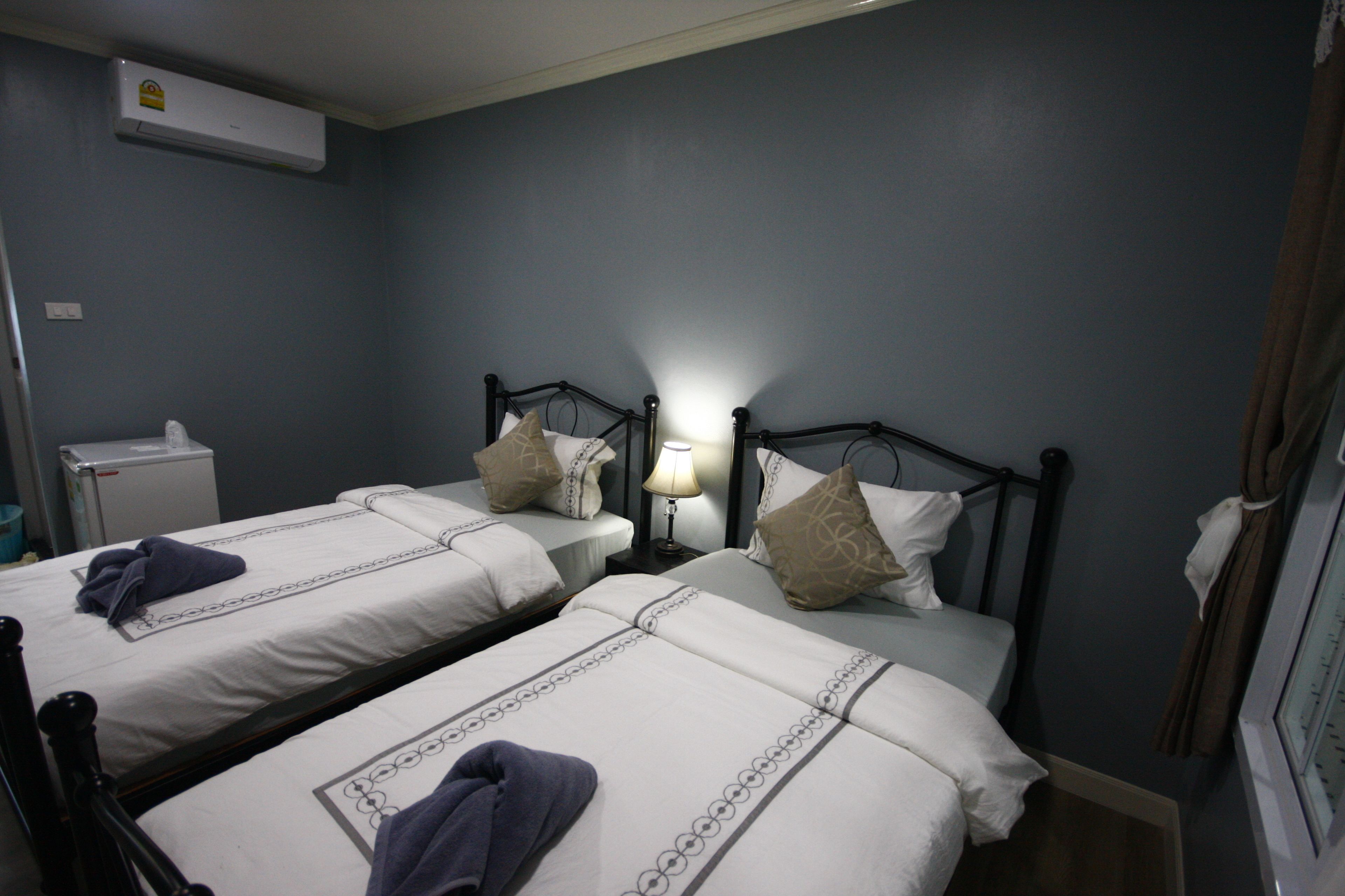 deluxe twin room | in-room safe, blackout curtains, soundproofing, rollaway beds