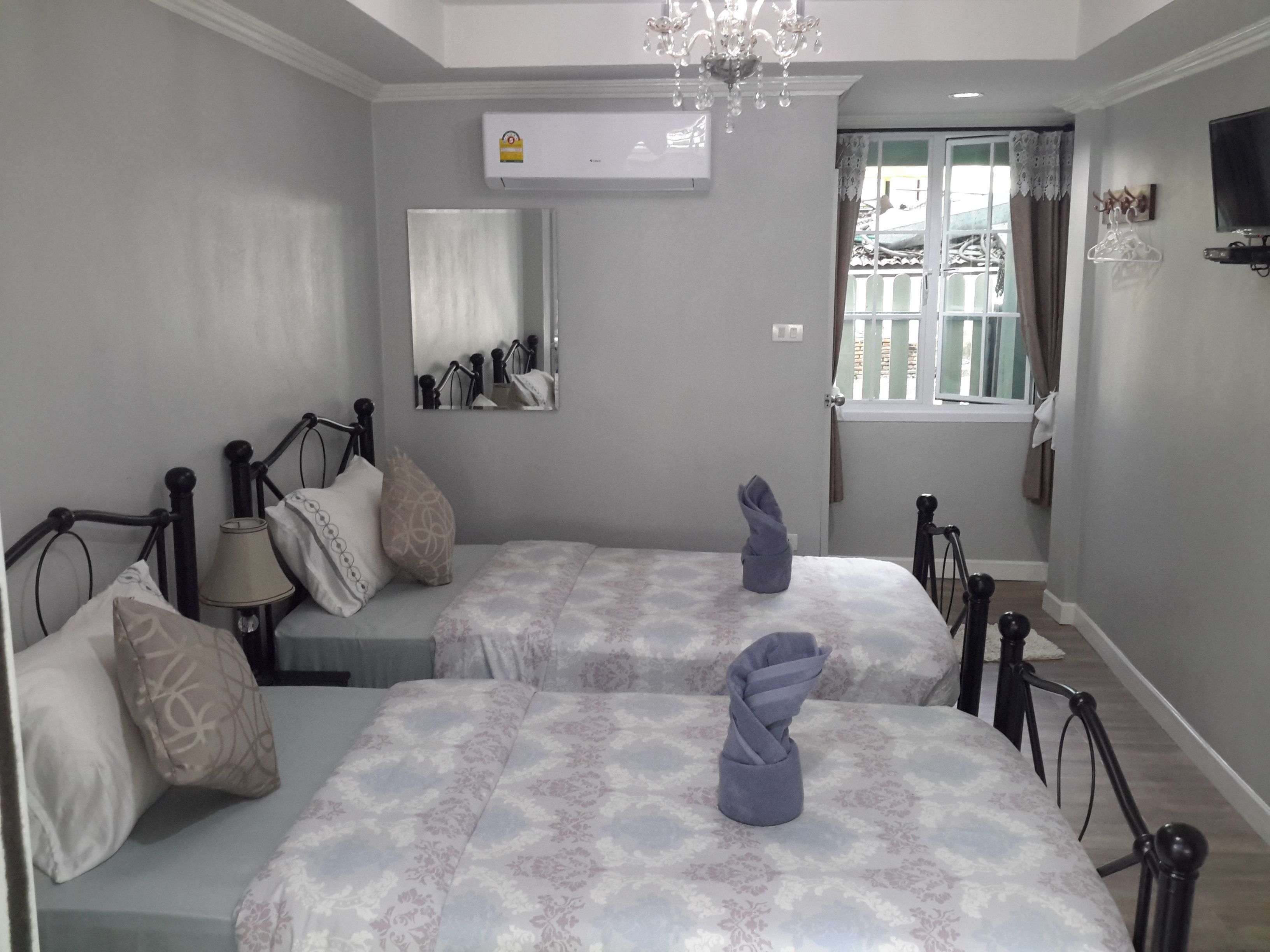 deluxe twin room | in-room safe, blackout curtains, soundproofing, rollaway beds