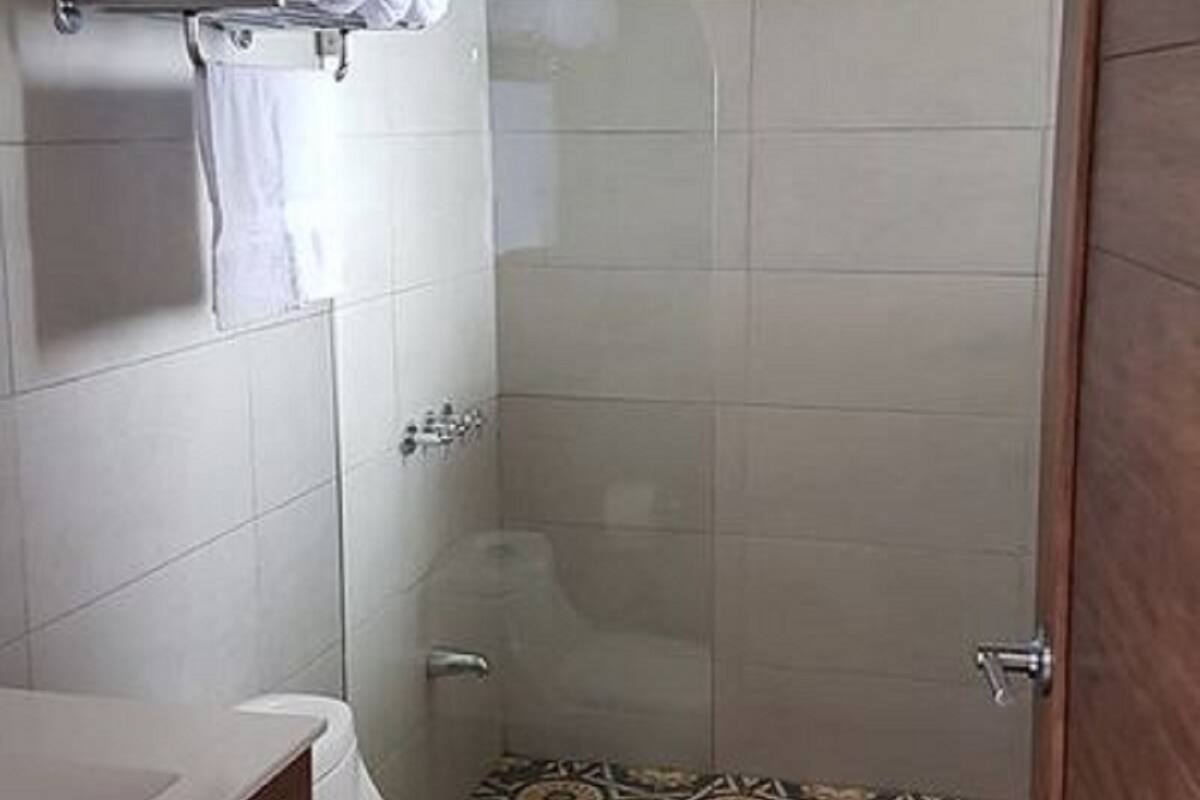 shower, designer toiletries, towels