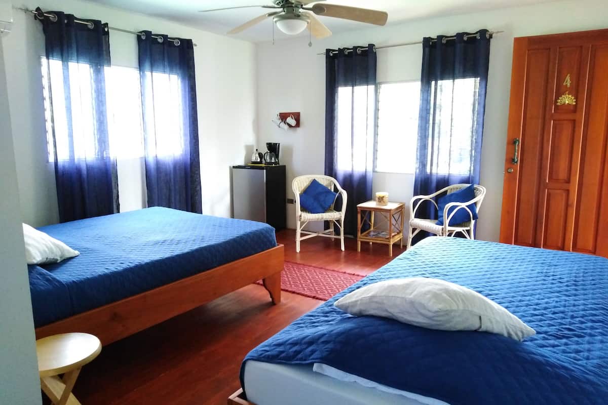 triple room, garden view | in-room safe, free wifi, bed sheets