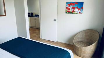 Two Bedroom | Desk, laptop workspace, soundproofing, cots/infant beds