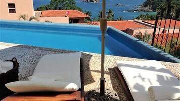 Kolam renang terbuka, kerusi lepak pantai