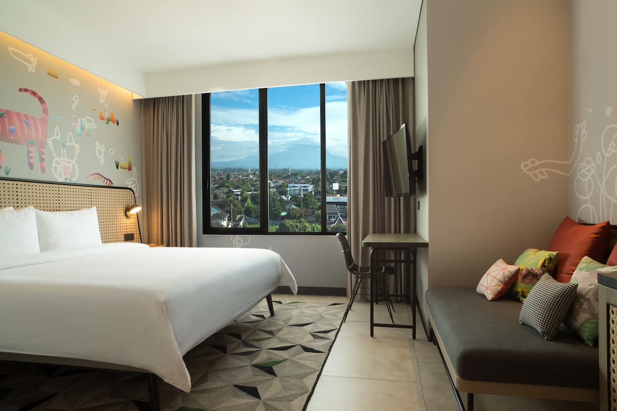 Luxe beddengoed, een minibar, een kluis op de kamer, een bureau