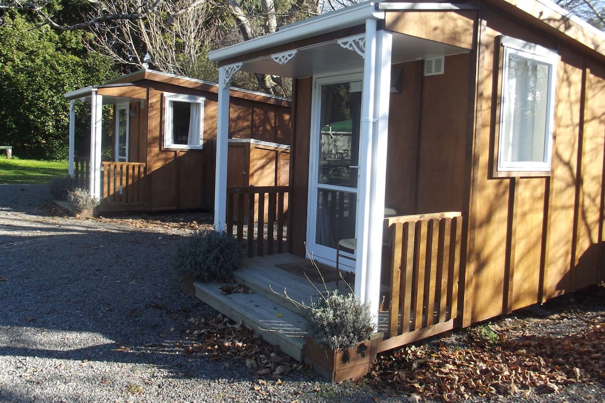 Basic Cabin, Multiple Beds, Shared Bathroom | Individually decorated, free WiFi, bed sheets