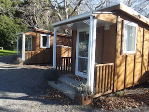 Basic Cabin, Multiple Beds, Shared Bathroom | Individually decorated, free WiFi, bed sheets - Greytown Campground (Greytown)
