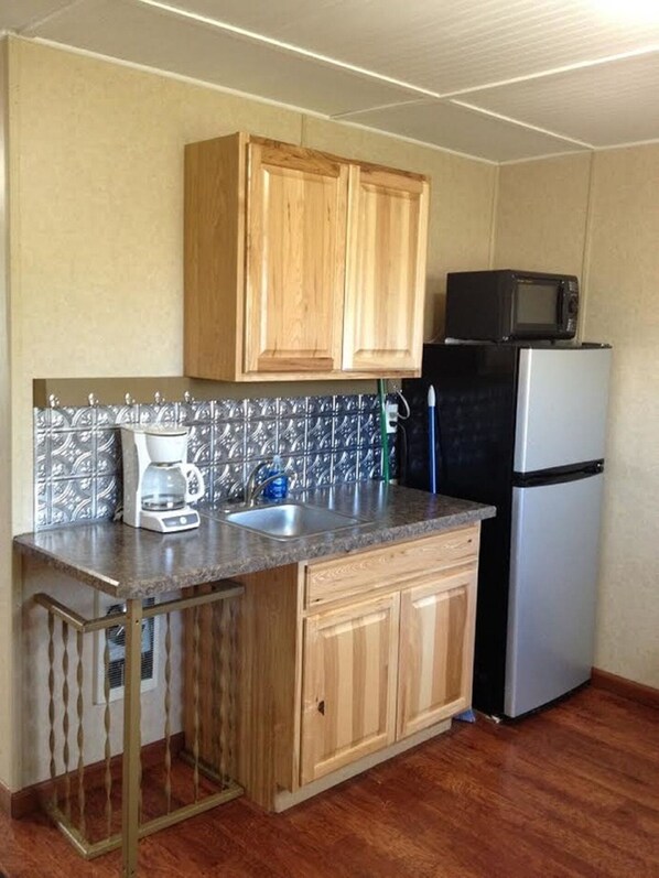 Fridge, microwave, coffee/tea maker, toaster