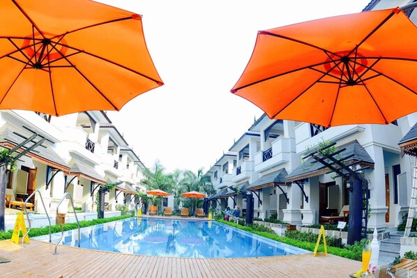 Outdoor pool, open 7:30 AM to 9:00 PM, pool umbrellas, pool loungers