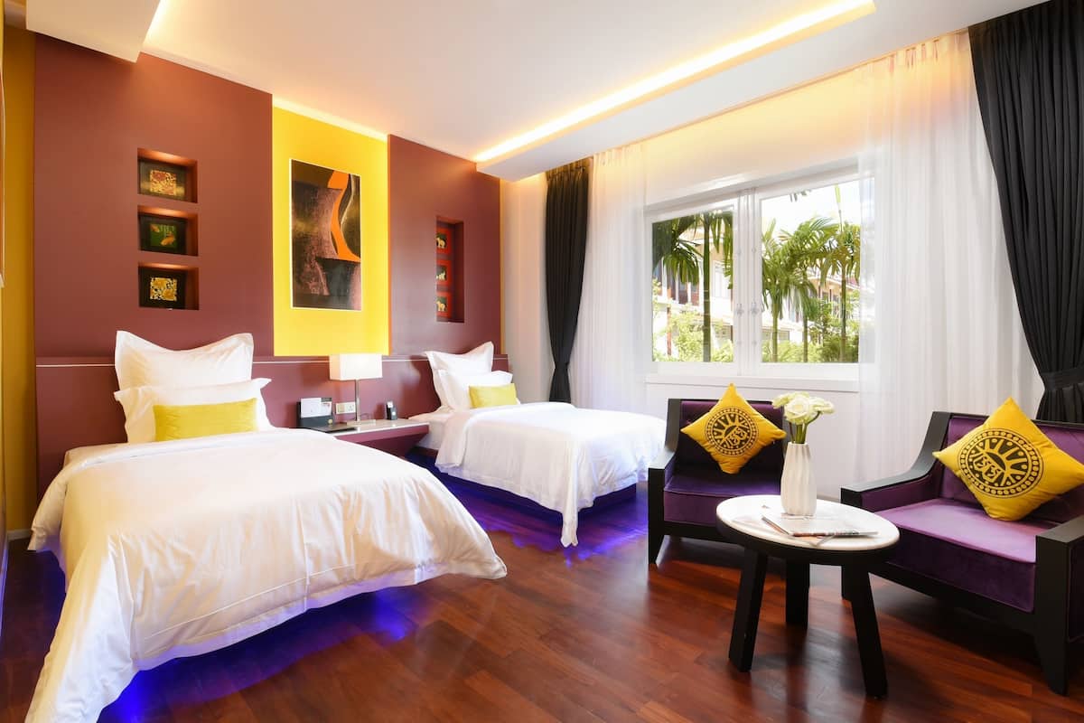 royal family suite with pool view | premium bedding, pillow-top beds, minibar, in-room safe