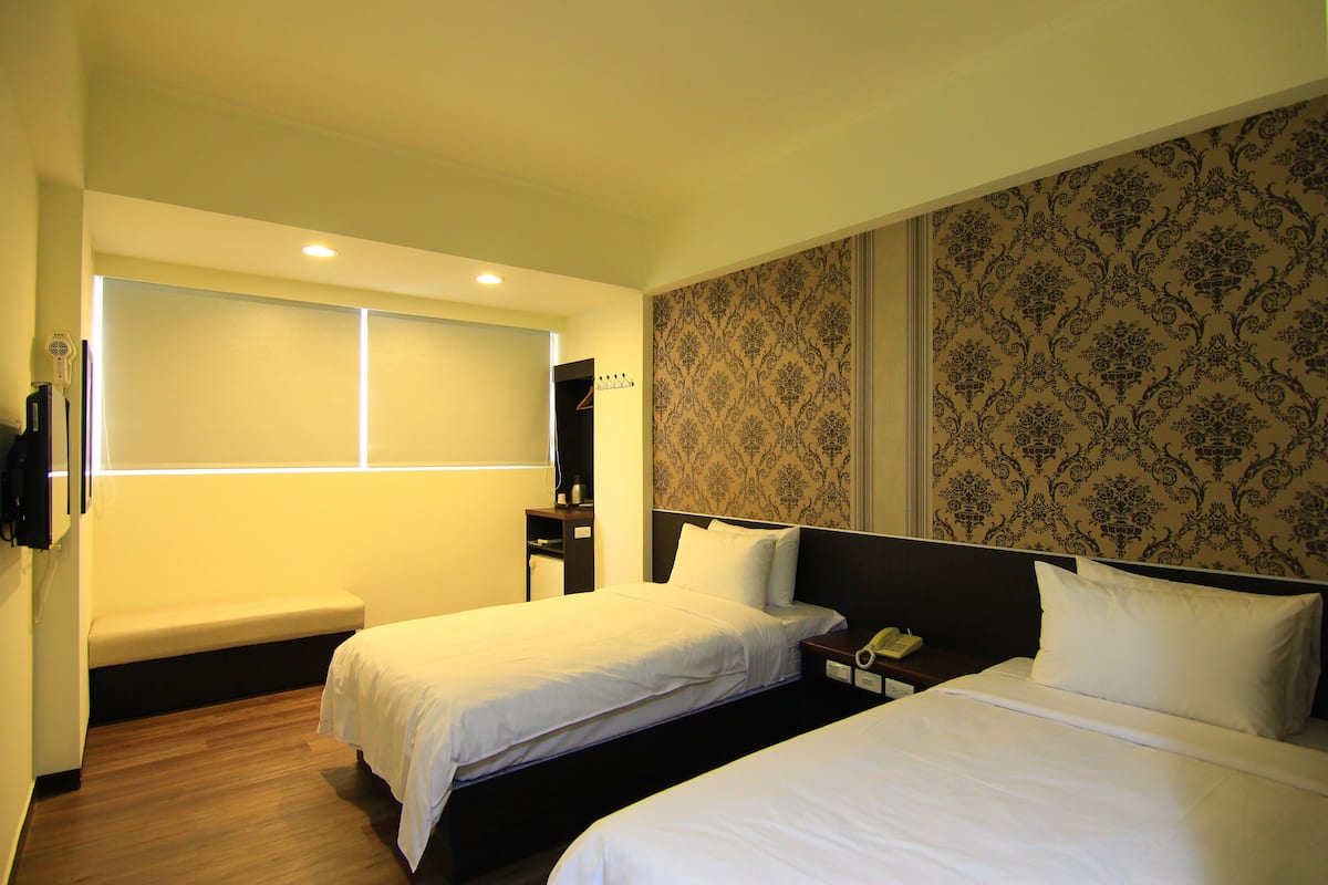 Habitación estándar con 2 camas individuales, vista al mar | Wifi gratis y ropa de cama