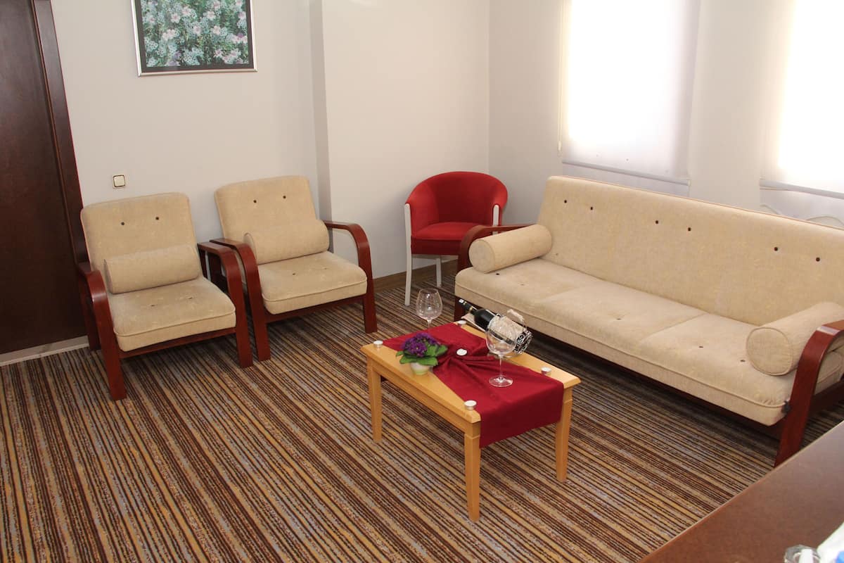 Family Suite | Living area | Flat-screen TV