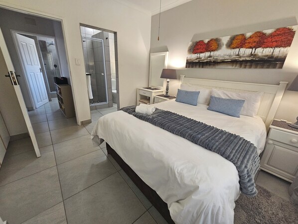 2 habitaciones, tabla de planchar con plancha, cunas y wifi gratis 