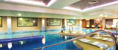 2 indoor pools, outdoor pool, open 9:00 AM to 8:00 PM, pool umbrellas