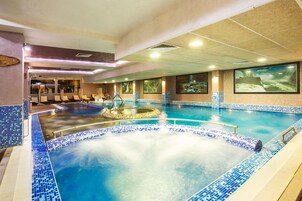 2 indoor pools, outdoor pool, open 9:00 AM to 8:00 PM, pool umbrellas
