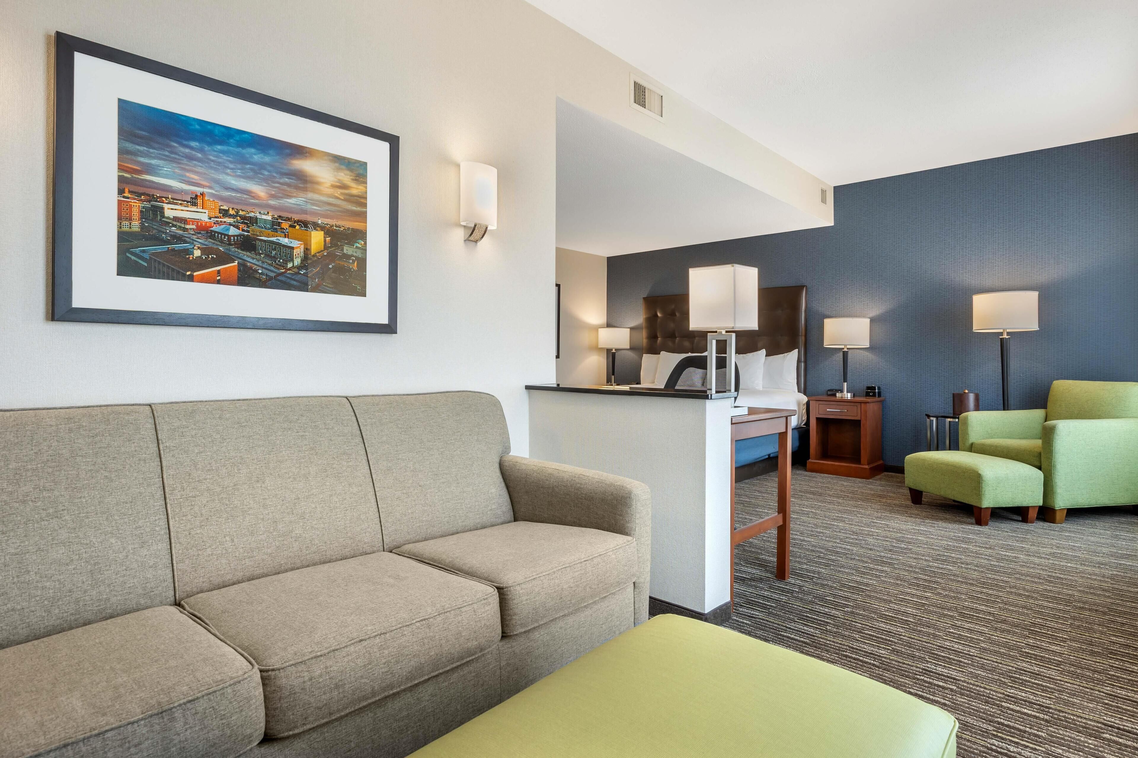 Desk, laptop workspace, blackout drapes, iron/ironing board