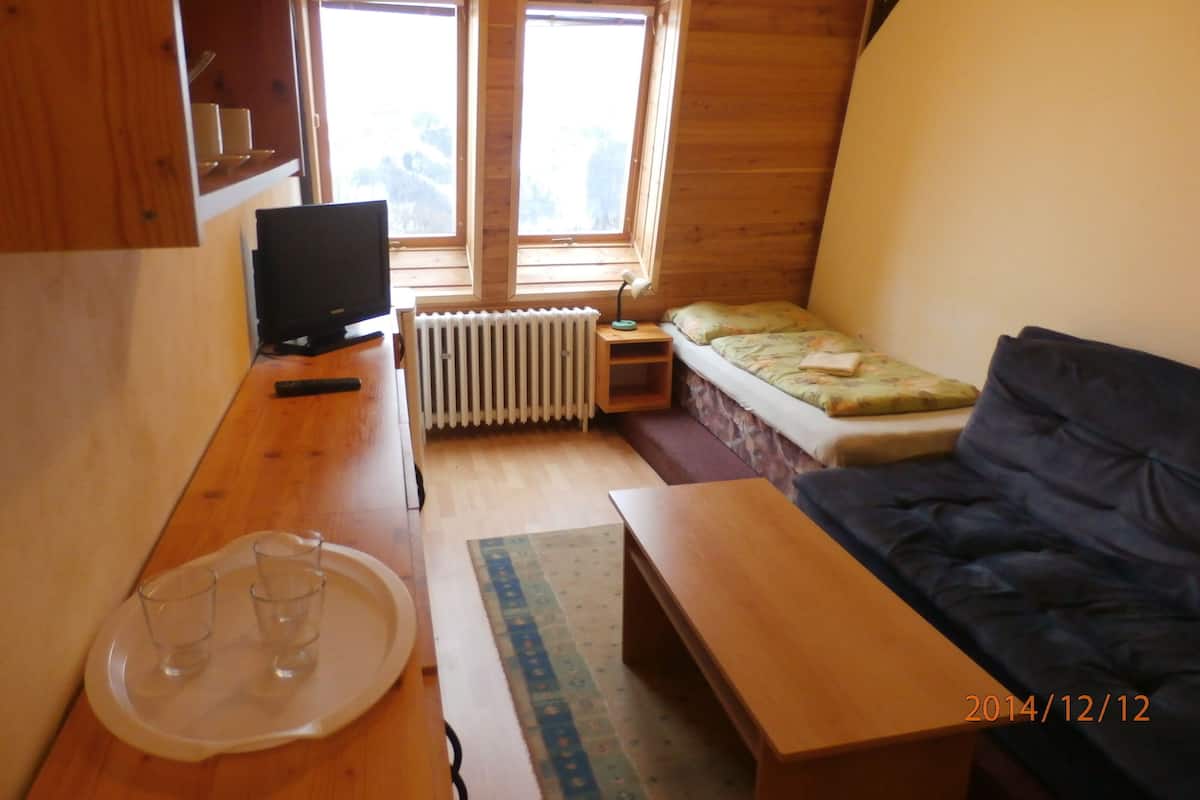 Desk, blackout curtains, free WiFi, bed sheets