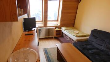 Desk, blackout curtains, free WiFi, bed sheets