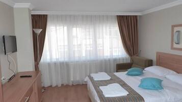 Standard Twin Room, 1 Bedroom | Free minibar, in-room safe, desk, laptop workspace