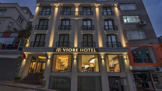A hotel with a prominent entrance, multiple balconies, and a sign reading "VIORE HOTEL". - Viore Hotel (Istanbul)