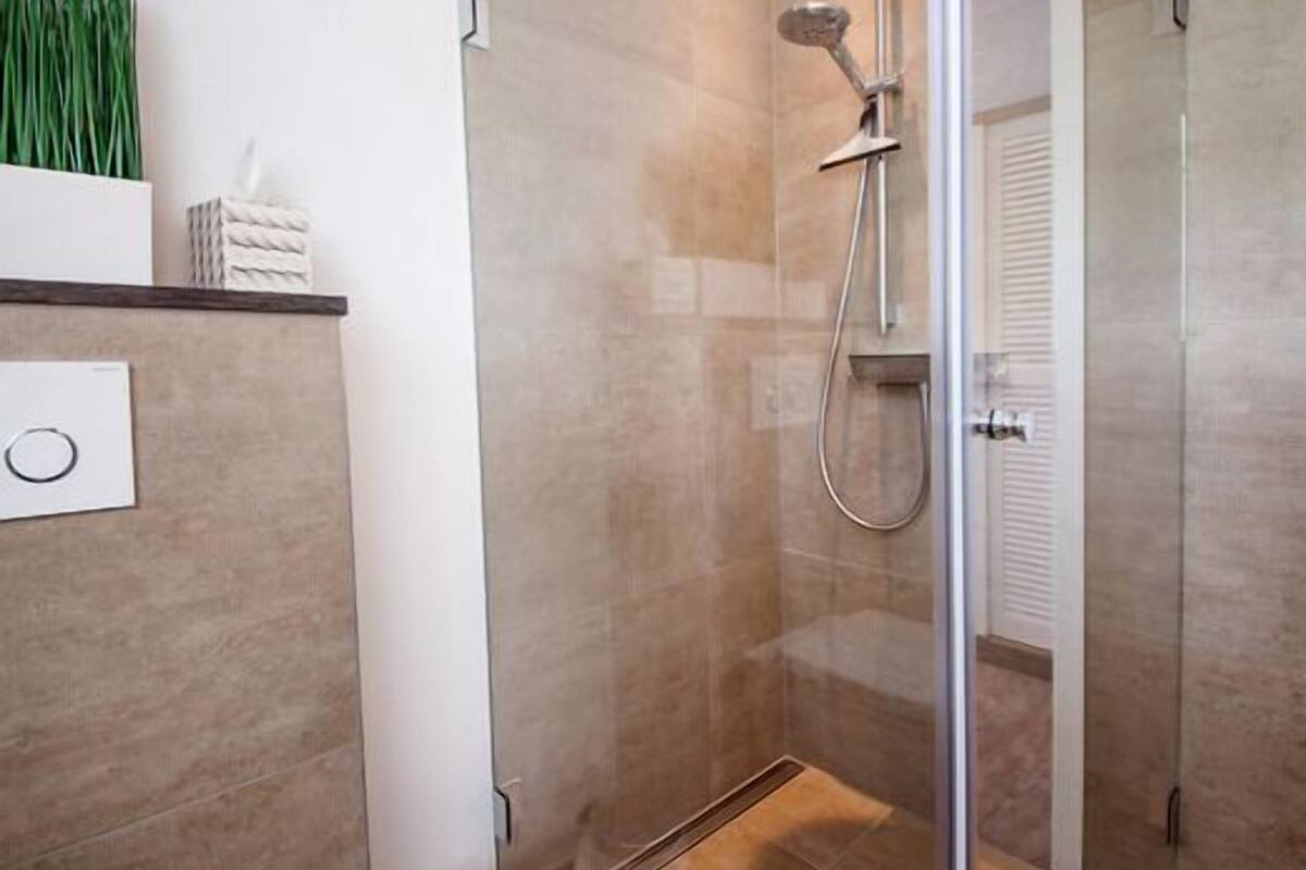 double room, balcony, garden view | bathroom shower