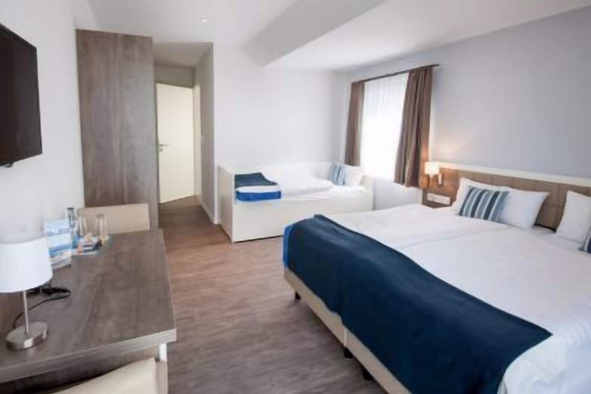 double room, balcony, garden view | in-room safe, desk, soundproofing, free cots/infant beds