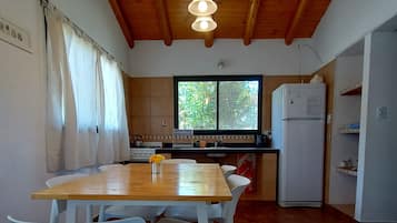 Classic Cabin, 2 Bedrooms | Private kitchen | Fridge, oven, stovetop, coffee/tea maker