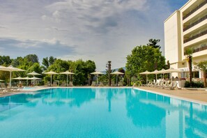 Outdoor pool, pool umbrellas, pool loungers - Olympian Bay Grand Resort by Anayia All Inclusive Resorts (Dio-Olympos)