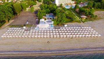 On the beach, sun loungers, beach umbrellas, beach towels