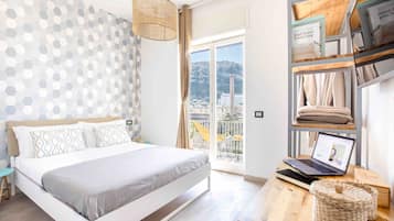 Style Room | Premium bedding, down comforters, in-room safe, desk