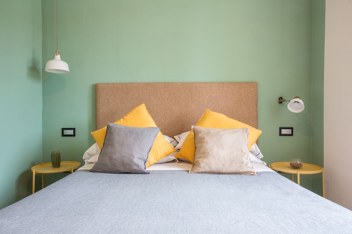 The Flat | Premium bedding, down comforters, in-room safe, desk
