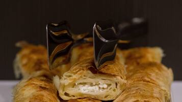 A tray of pastries with a fork.