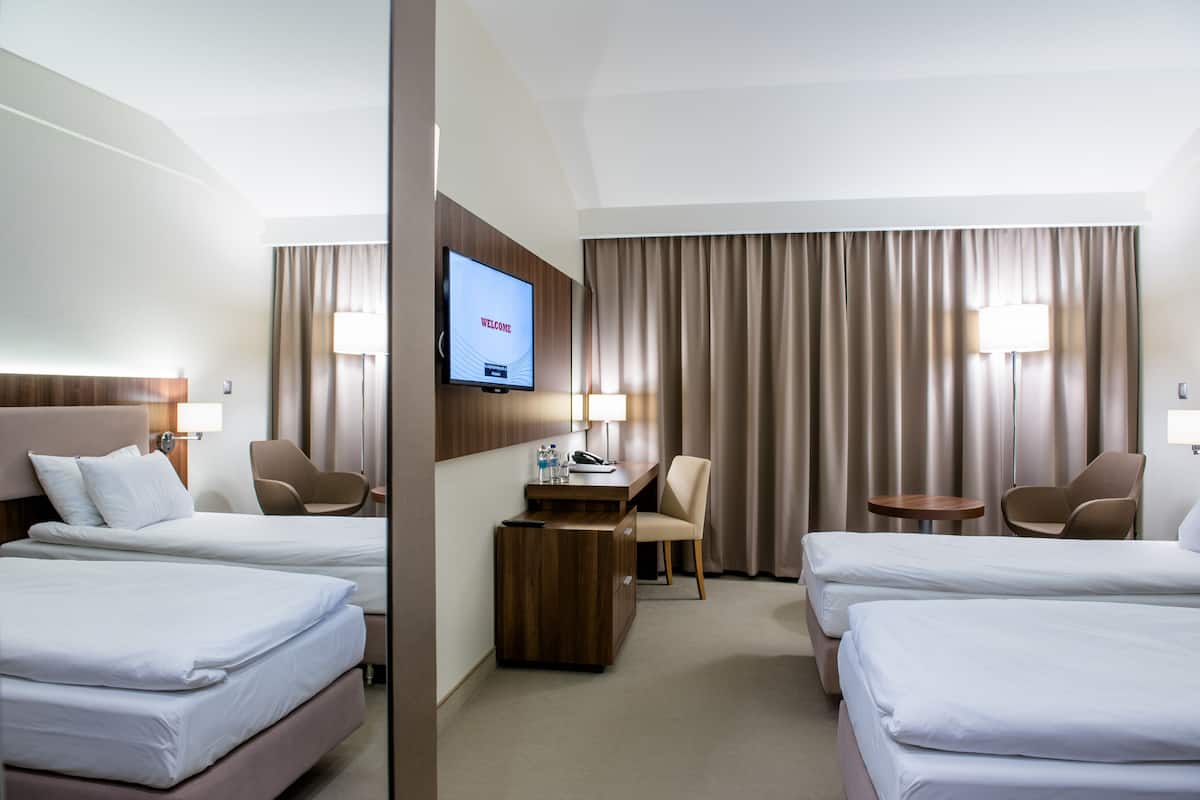 premium bedding, desk, laptop workspace, soundproofing