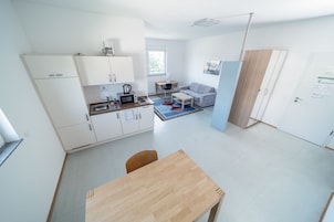 Apartamento luxo, 1 quarto, para não fumantes, cozinha americana | 1 quarto, espaço de trabalho para notebook, cortinas blackout
