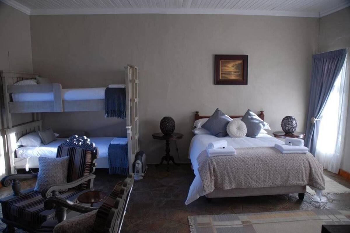 Suite familiale, 1 chambre | Coffre-fort, accès au Wi-Fi (inclus), literie fournie
