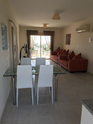 Standard Apartment, 1 Bedroom, Pool View | Living area | Flat-screen TV, DVD player