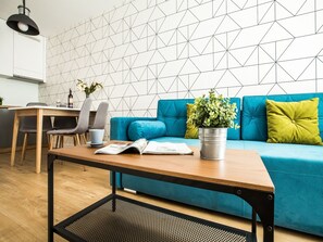 Executive Apartment, 1 Bedroom, Balcony | Living area | 55-inch flat-screen TV with digital channels, TV, Netflix