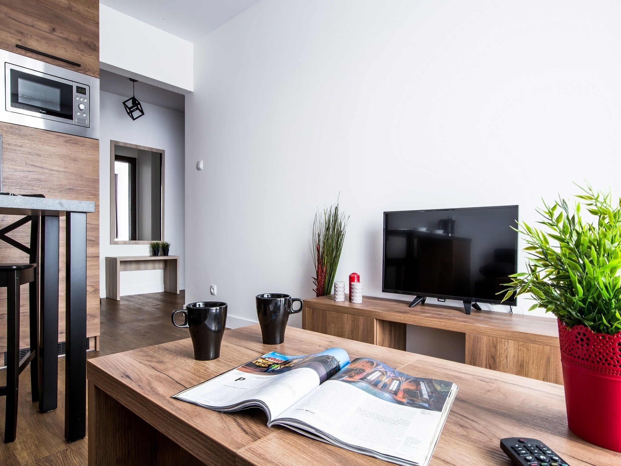 comfort apartment, 1 bedroom, balcony | living area | 55-inch flat-screen tv with cable channels, tv, netflix