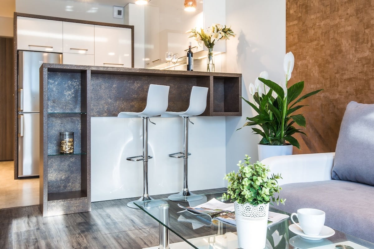 deluxe apartment, 1 bedroom, balcony | living area | 55-inch flat-screen tv with cable channels, tv, netflix