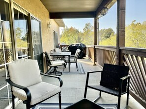 Outdoor dining - Upper level Condo A-7 with Large Private Balcony by RedAwning (Hollister)