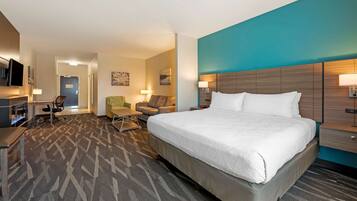 Suite, 1 trÚs grand lit, non-fumeurs, baignoire à jets | Surmatelas, décoration personnalisée, ameublement personnalisé, bureau