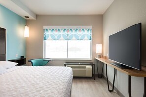 Luxe beddengoed, verduisterende gordijnen, een strijkplank/strijkijzer