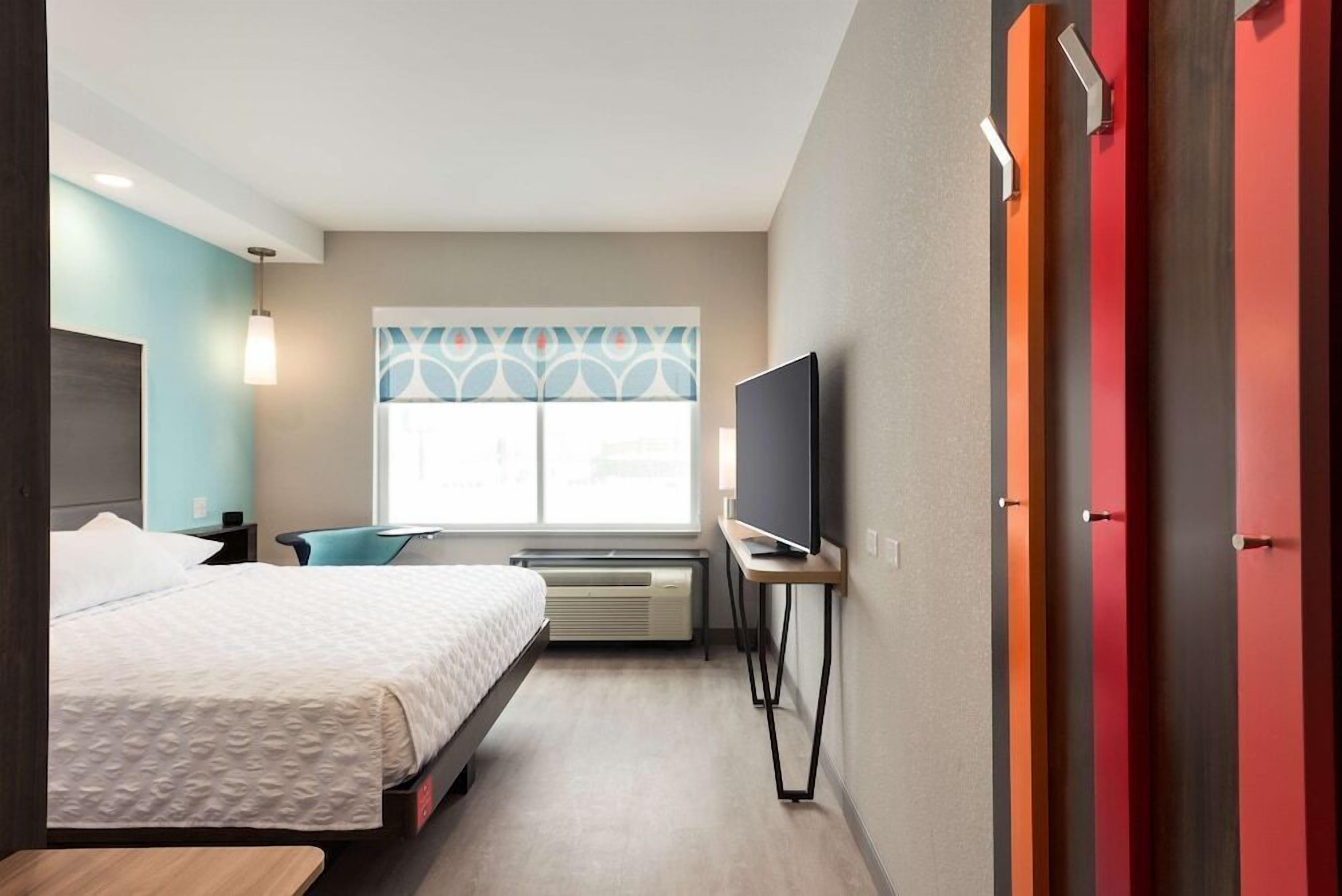 Premium bedding, blackout drapes, iron/ironing board