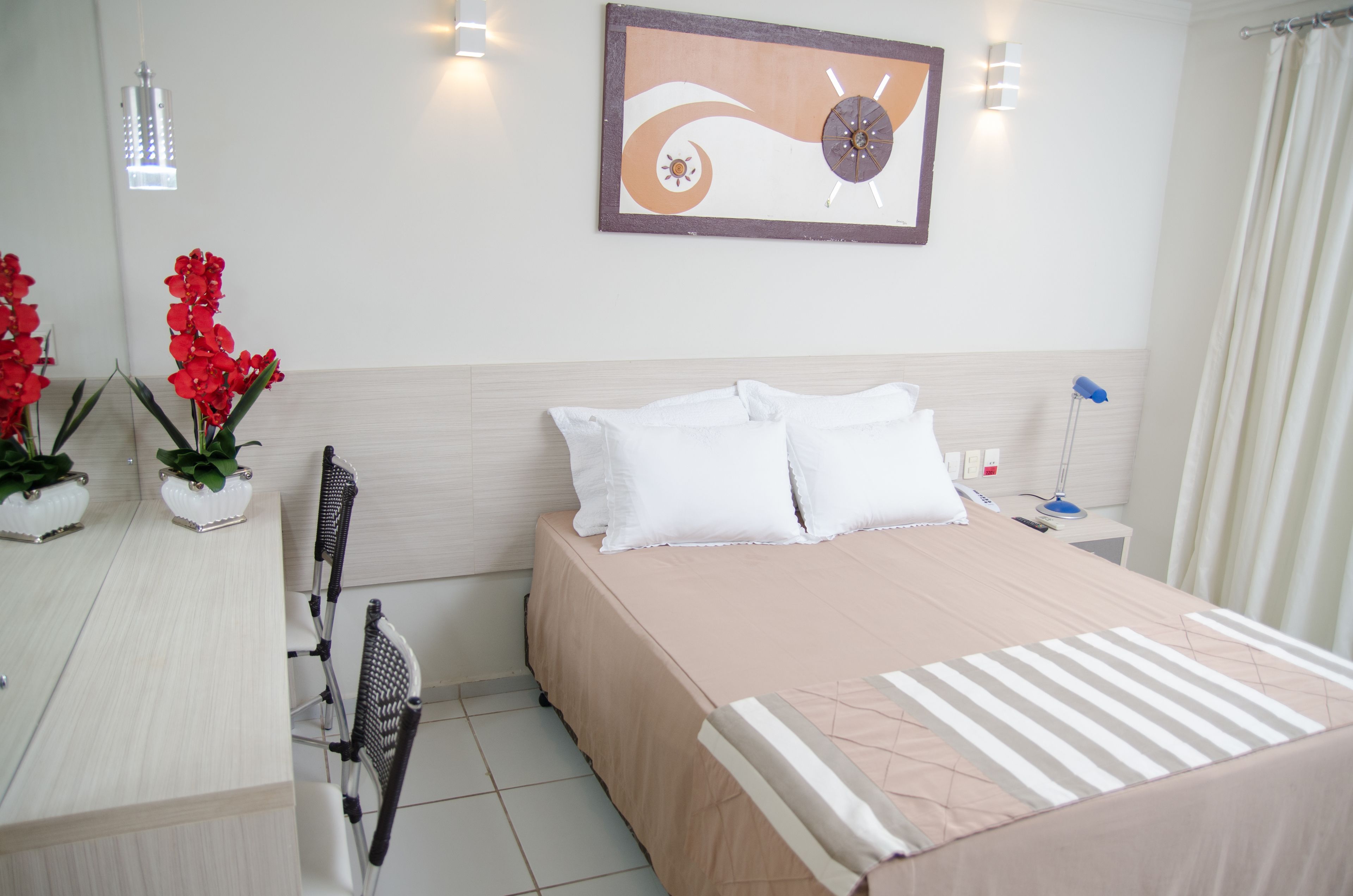 deluxe room | 1 bedroom, minibar, in-room safe, desk