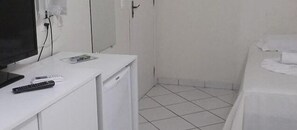 Minibar, desk, blackout drapes, iron/ironing board