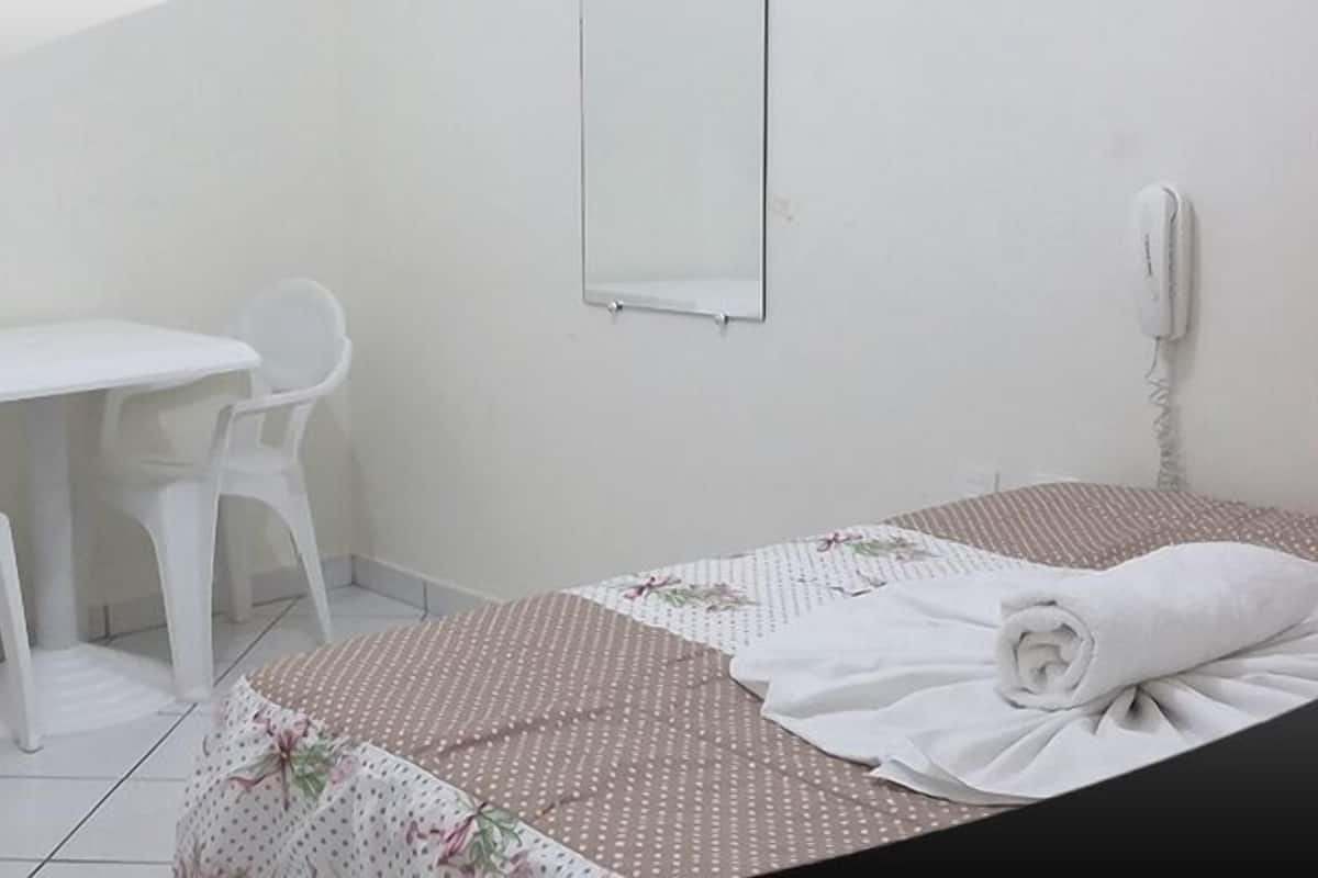 Double Room | Minibar, desk, blackout curtains, iron/ironing board