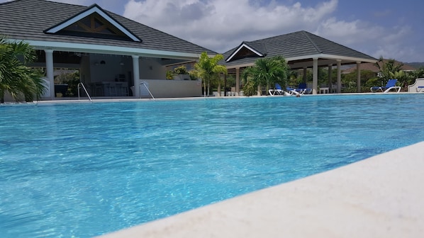 Outdoor pool, pool umbrellas, pool loungers