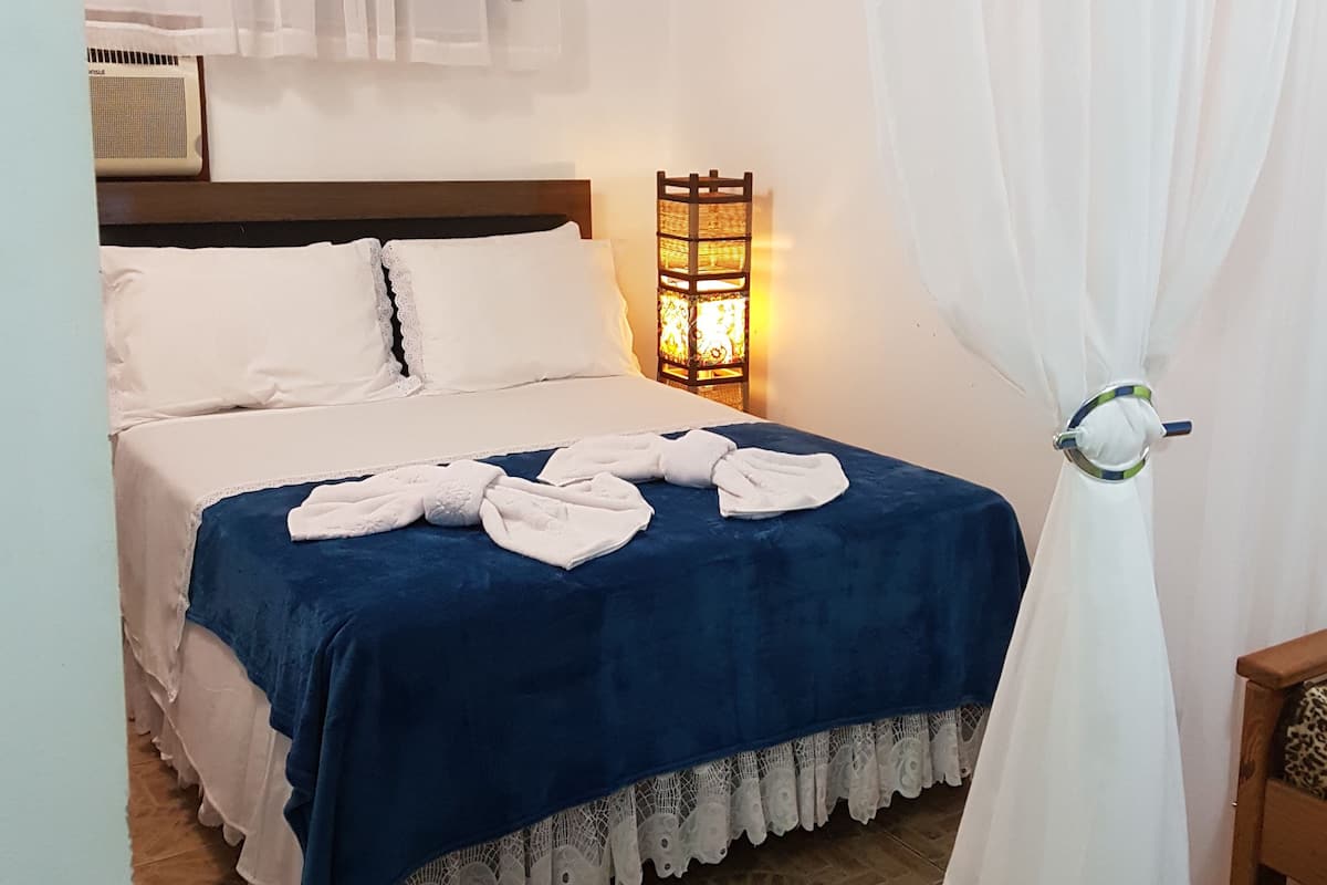 Chambre Quadruple | Minibar, rideaux occultants, Wi-Fi gratuit, draps fournis
