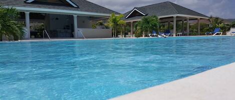 Outdoor pool, pool umbrellas, pool loungers